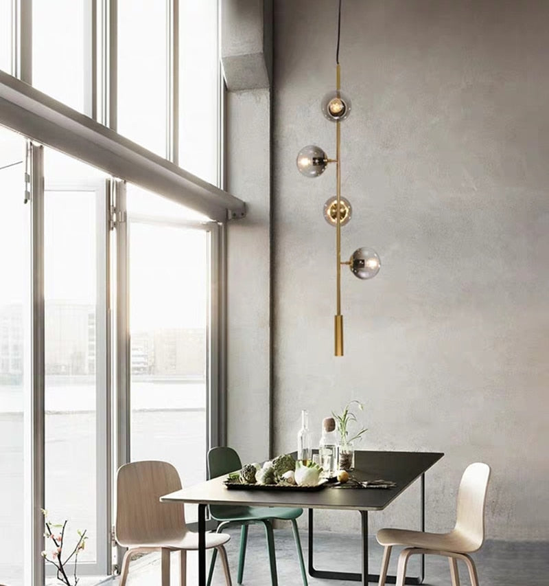 Solara Six-Sphere Amber Glass Pendant Light with Gold Rods | Lersk