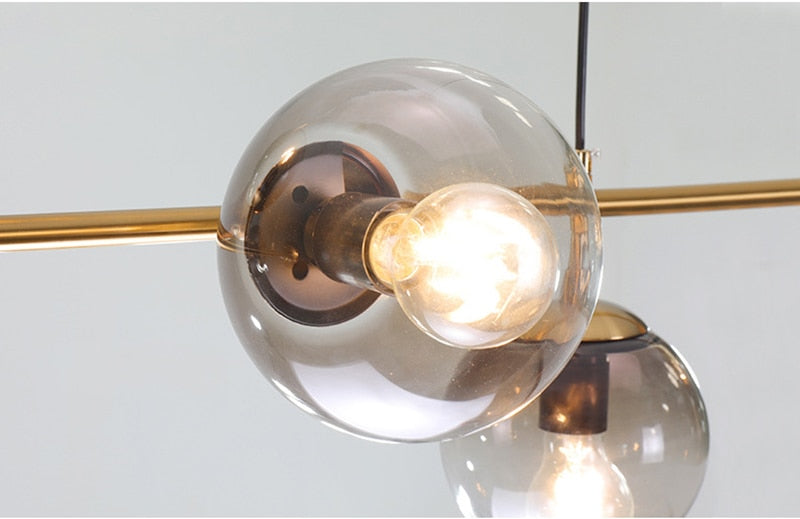 Solara Six-Sphere Amber Glass Pendant Light with Gold Rods | Lersk