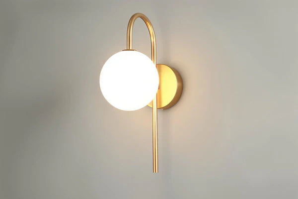 Solara Brass Wall Light With Opal Glass Shade Vertical Glow | Lersk