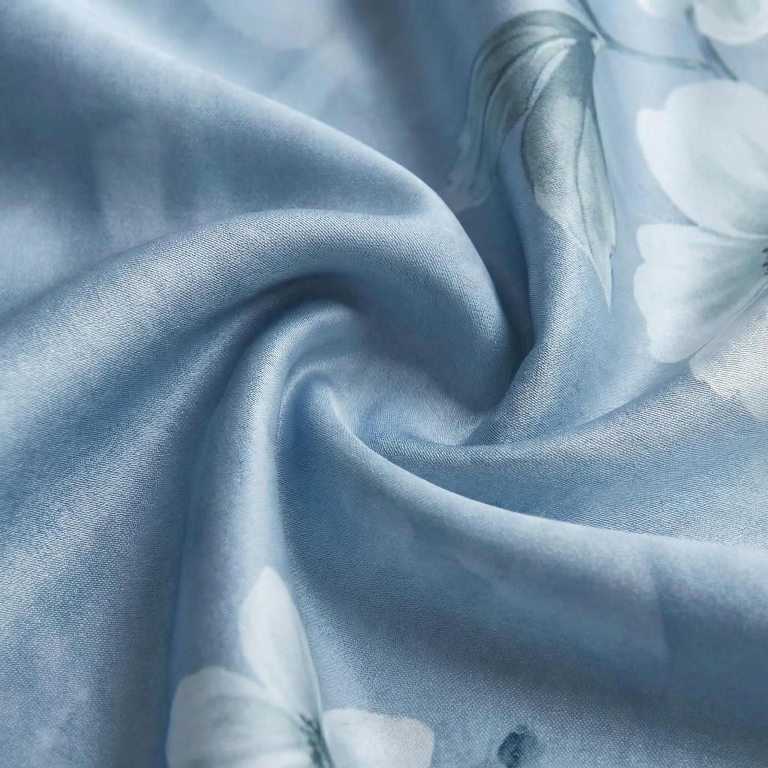 Tranquil Peacock Bedding Set With Icy Blue Base And Floral Accents | Lersk