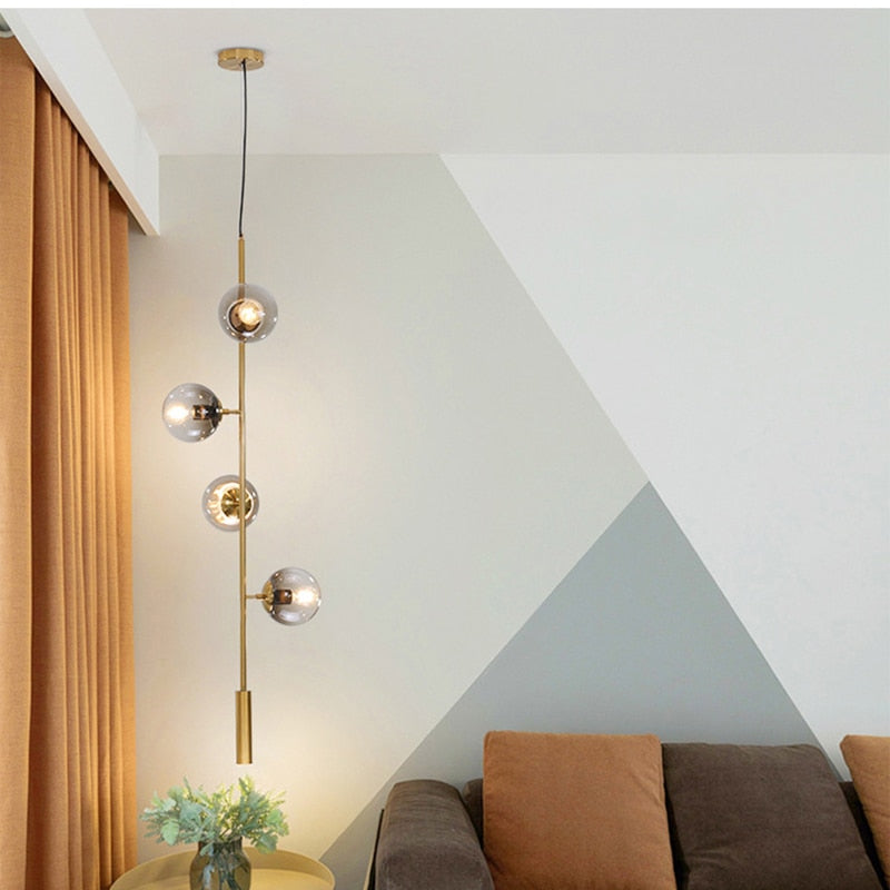 Solara Six-Sphere Amber Glass Pendant Light with Gold Rods | Lersk