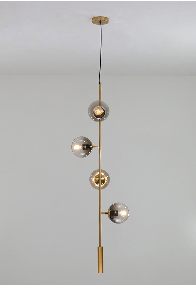Solara Six-Sphere Amber Glass Pendant Light with Gold Rods | Lersk
